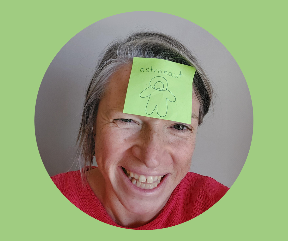 Emily with post-it with astronaut on her head